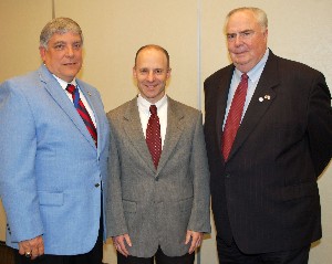 Vic Budura, chapter president (l), meets with Daniel E. Irwin, NASA research scientist, and Tom Gwaltney, regional vice president, following the March meeting. 